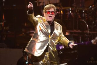 Foto: Elton John. Crédito: Leon Neal.