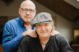 Foto Mark Knopfler & Brian Johnson