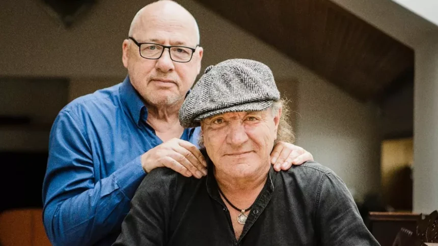 Foto Mark Knopfler & Brian Johnson