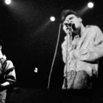 Foto: The Smiths, Johnny Marr e Morrissey. Crédito: Steve Rapport.