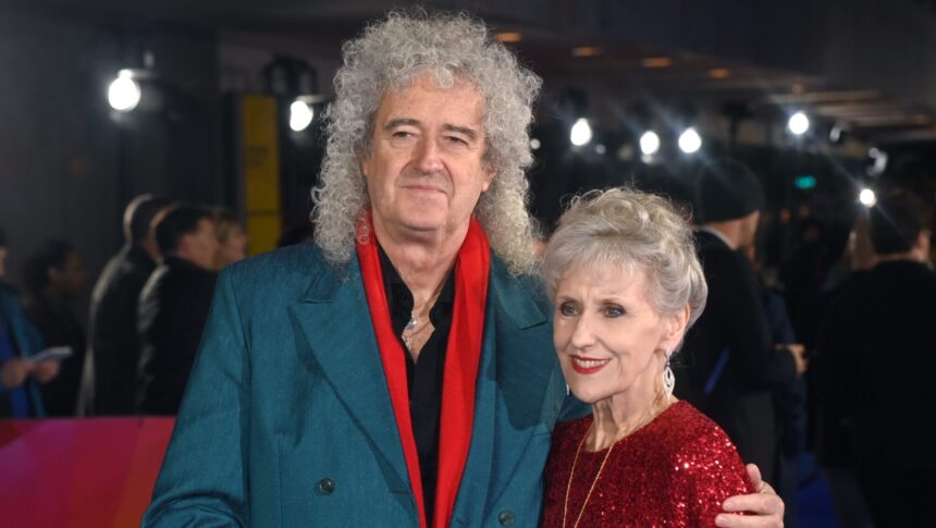 Foto: Brian May e Anita Dobson. Crédito: Dave J Hogan/Getty Images