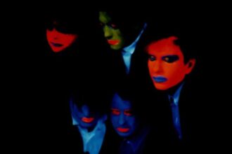 The Cure The Head On The Door pôster promocional.