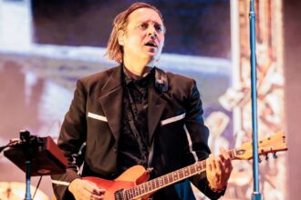 Win Butler/Arcade Fire. Crédito: Sergione Infuso/Corgis/Getty Images.