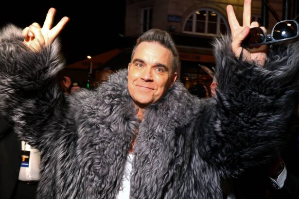 Robbie Williams. Crédito: Marc Piasecki/Getty Images.