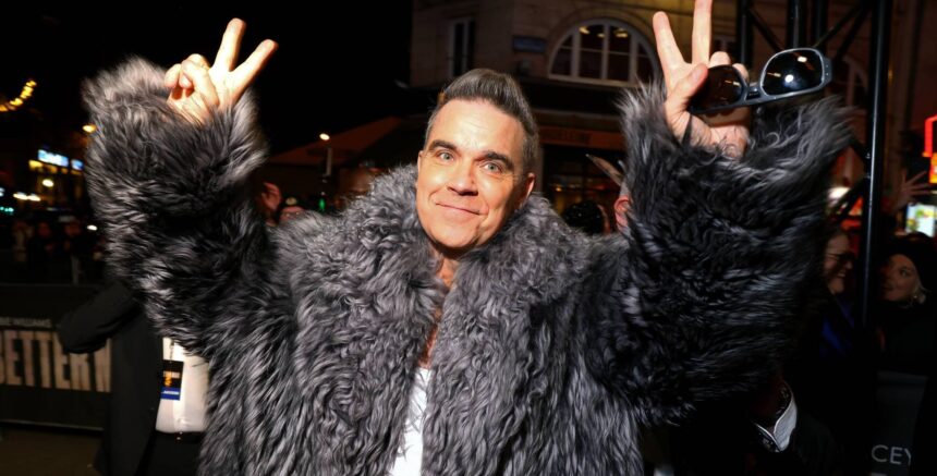 Robbie Williams. Crédito: Marc Piasecki/Getty Images.