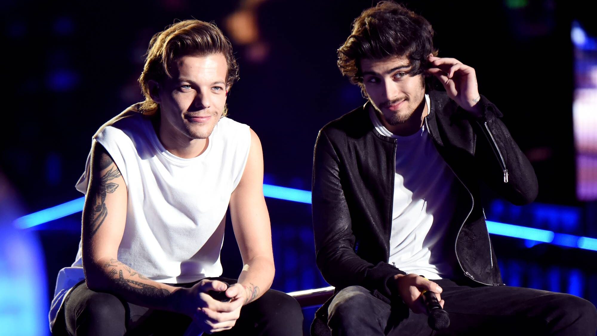 . Louis Tomlinson and Zayn Malik at Rose Bowl on September 11, 2014 in Pasadena, California.  (by Jeff Kravitz/OneD/Getty Images)