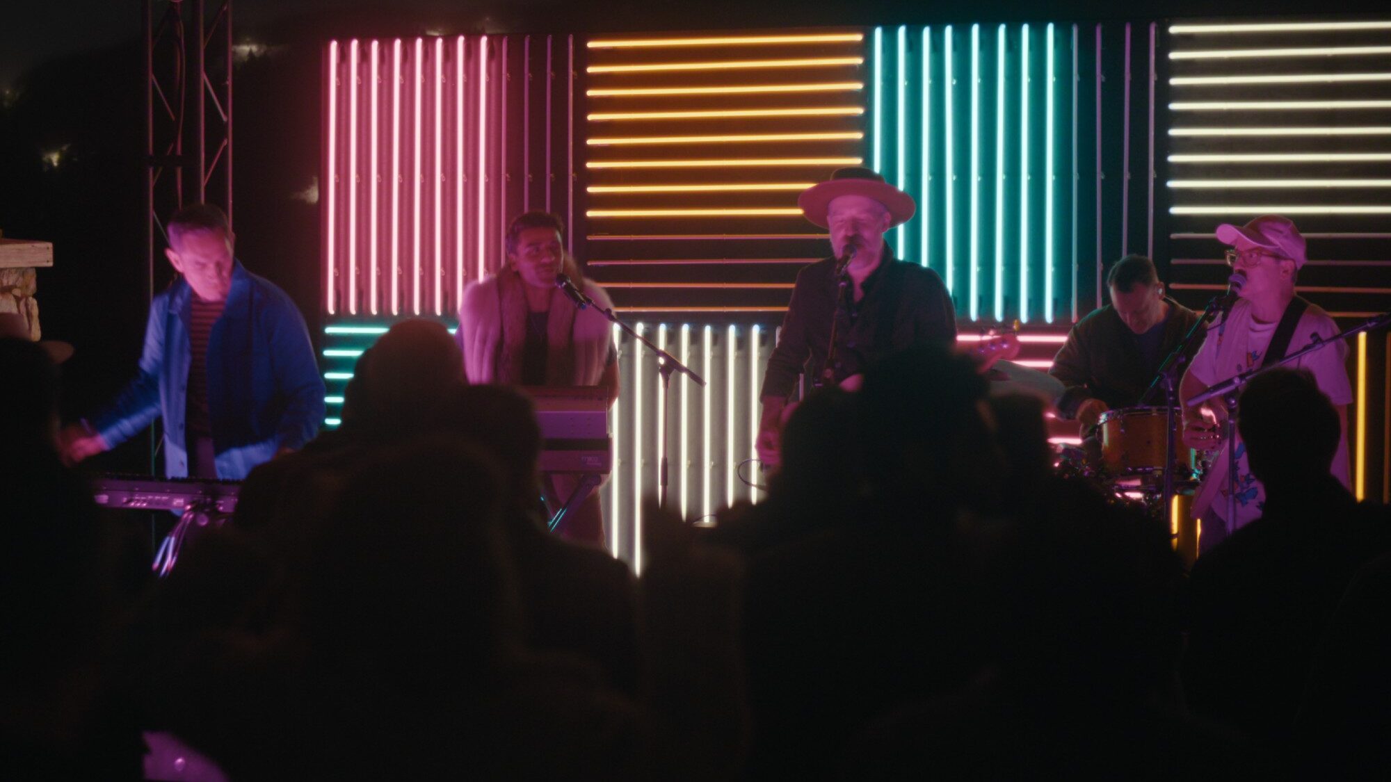 Hot Chip. Oscar Isaac (second left) with  in 'Beef'. Netflix