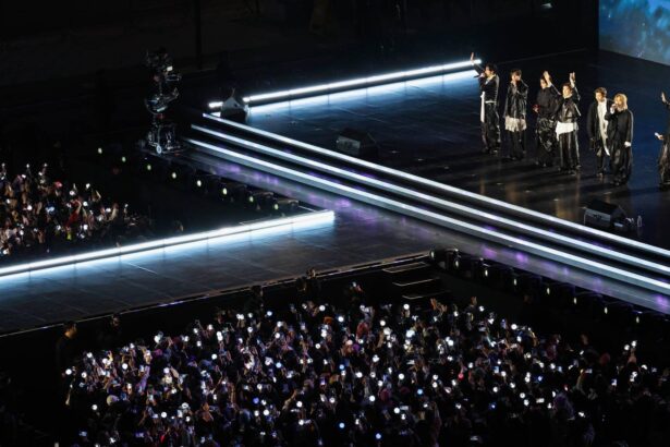 K-pop agencies. BTS perform onstage during comeback concert at Gwanghwamun Square on March 21, 2026 in Seoul, South Korea. (by Kim Hong-Ji - Pool/Getty Images)