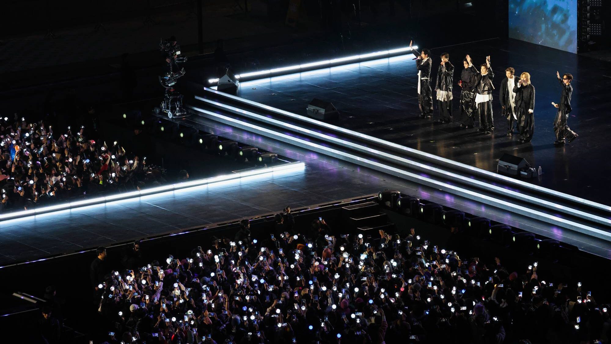 K-pop agencies. BTS perform onstage during comeback concert at Gwanghwamun Square on March 21, 2026 in Seoul, South Korea. (by Kim Hong-Ji - Pool/Getty Images)