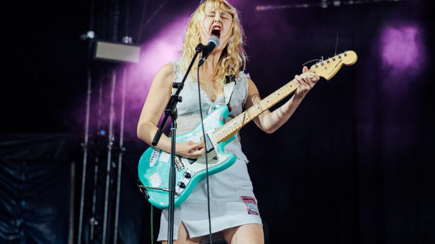 Lambrini Girls. Phoebe Lunny of  live at Reading 2024. Andy Ford for NME