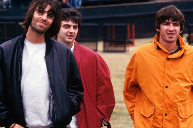 Oasis. Liam Gallagher, Paul 'Guigsy' McGuigan and Noel Gallagher, 1996. Mick Hutson/Redferns/Getty