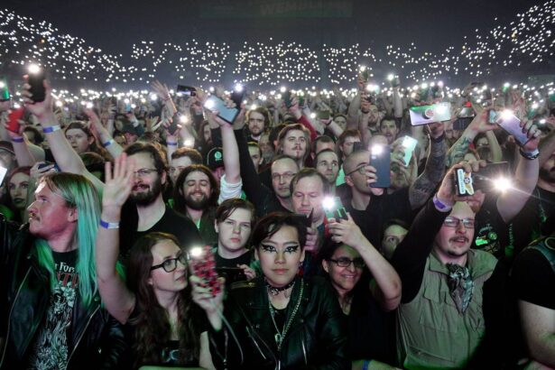 . The crowd light up their phones as they watch Sabaton at Wembley Arena on April 15, 2023 in London, England. (by Jim Dyson/Getty Images)