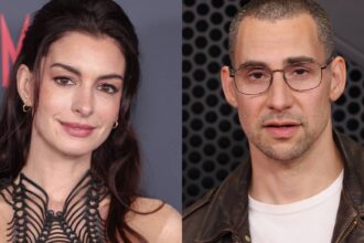 Anne Hathaway. and Jack Antonoff. John Phillips/Getty for A24 and John Shearer/Getty for The Recording Academy