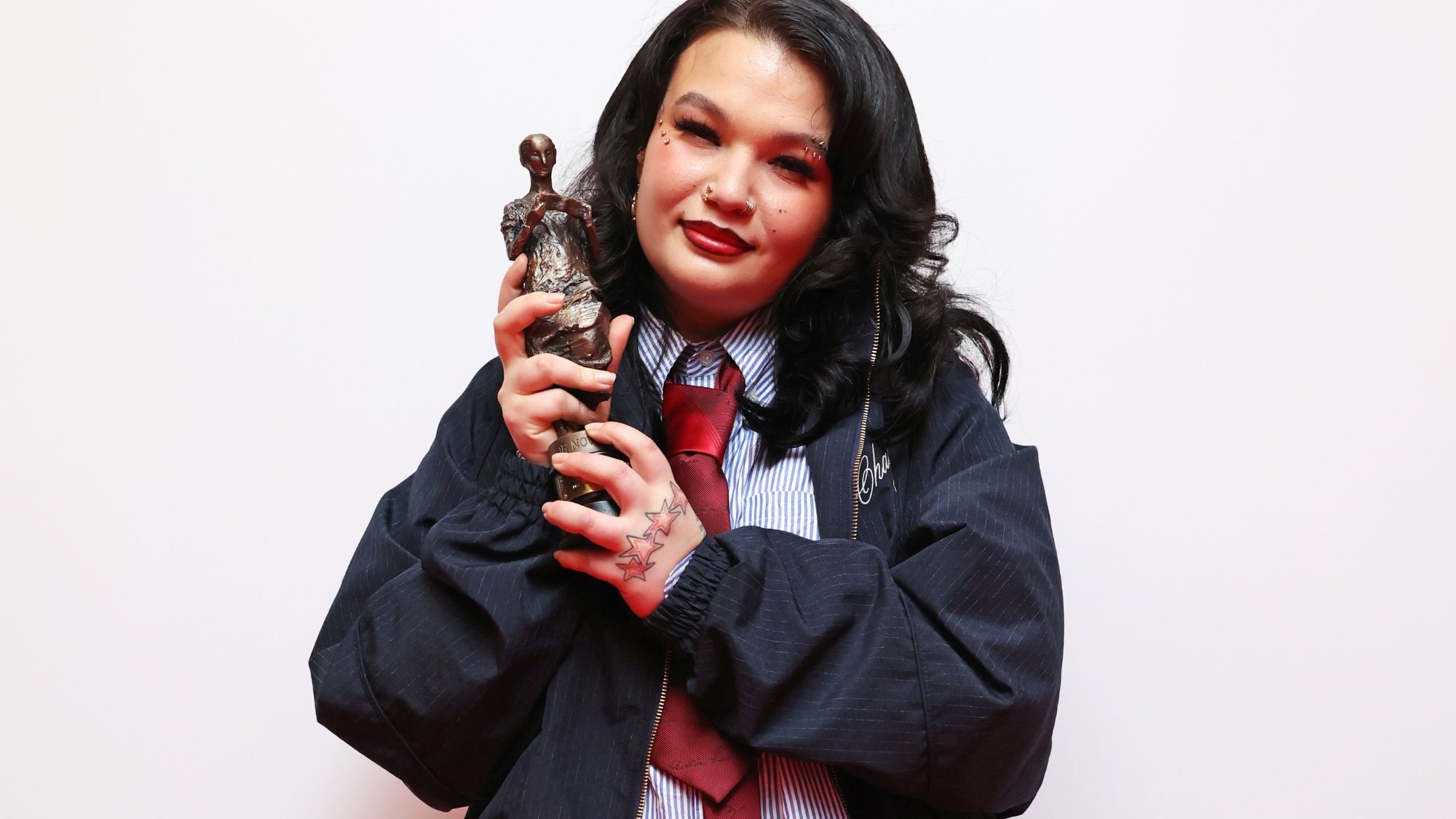 Lola Young. at The Ivor Novello Awards 2026. Jahnay Tennai/Dave Benett/Getty Images