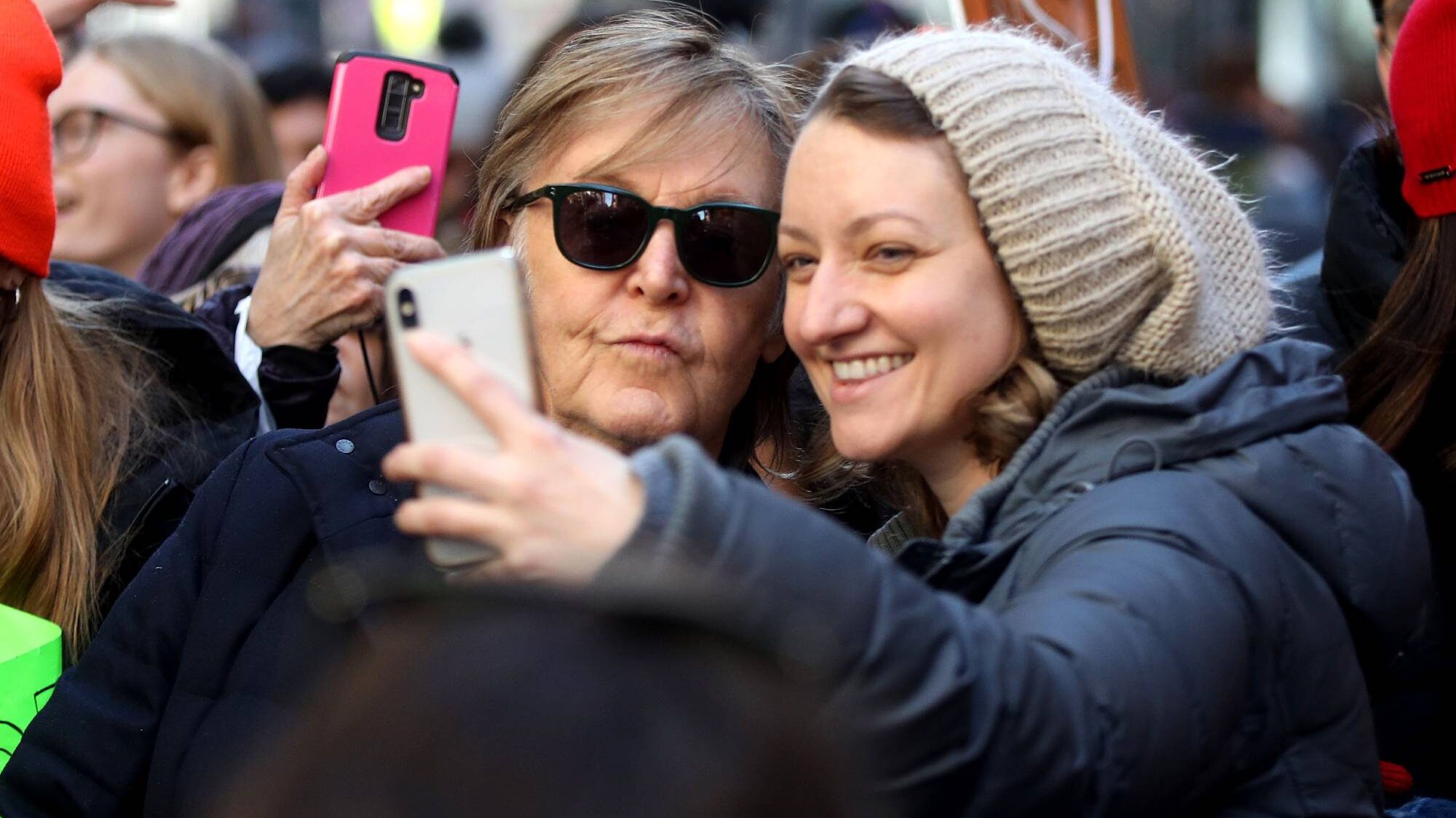 Paul McCartney. A girl takes a selfie with  during the "March For Our Lives" protest against gun violence on March 24, 2018 in New York, United States. (by Atilgan Ozdil/Anadolu Agency/Getty Images)