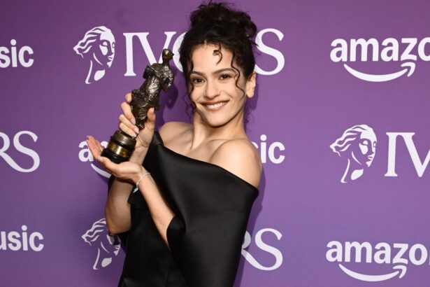 Rosalía. with the International Songwriter of the Year for the album "Lux" during The Ivors 2026 at Grosvenor House on May 21, 2026 in London, England.  (by Eamonn M. McCormack/Getty Images)
